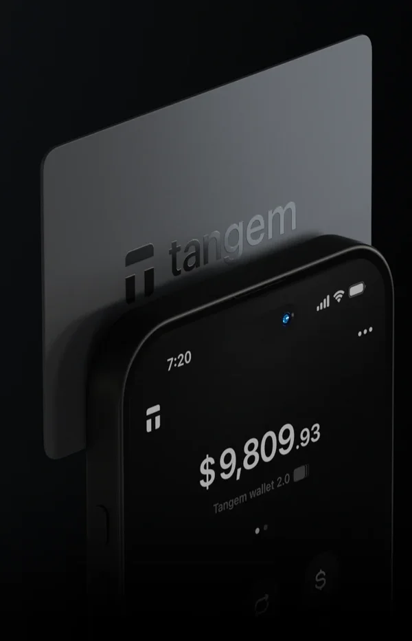 Tangem hardware wallet card with the companion app open on a phone